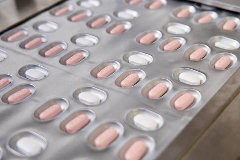 This photo shows Pfizer's COVID-19 Paxlovid pills. (Pfizer via AP)