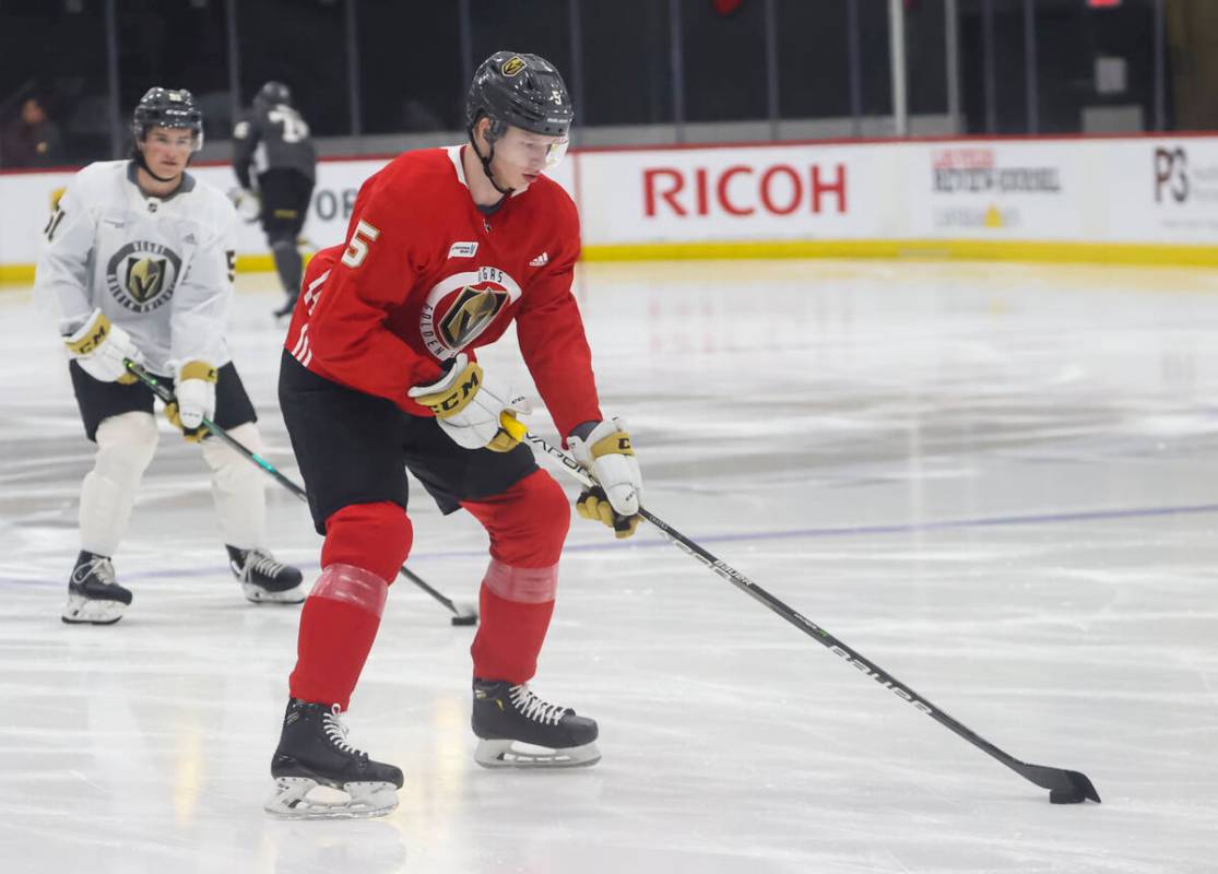 Golden Knights defenseman Daniil Chayka skates with the puck during development camp at City Na ...