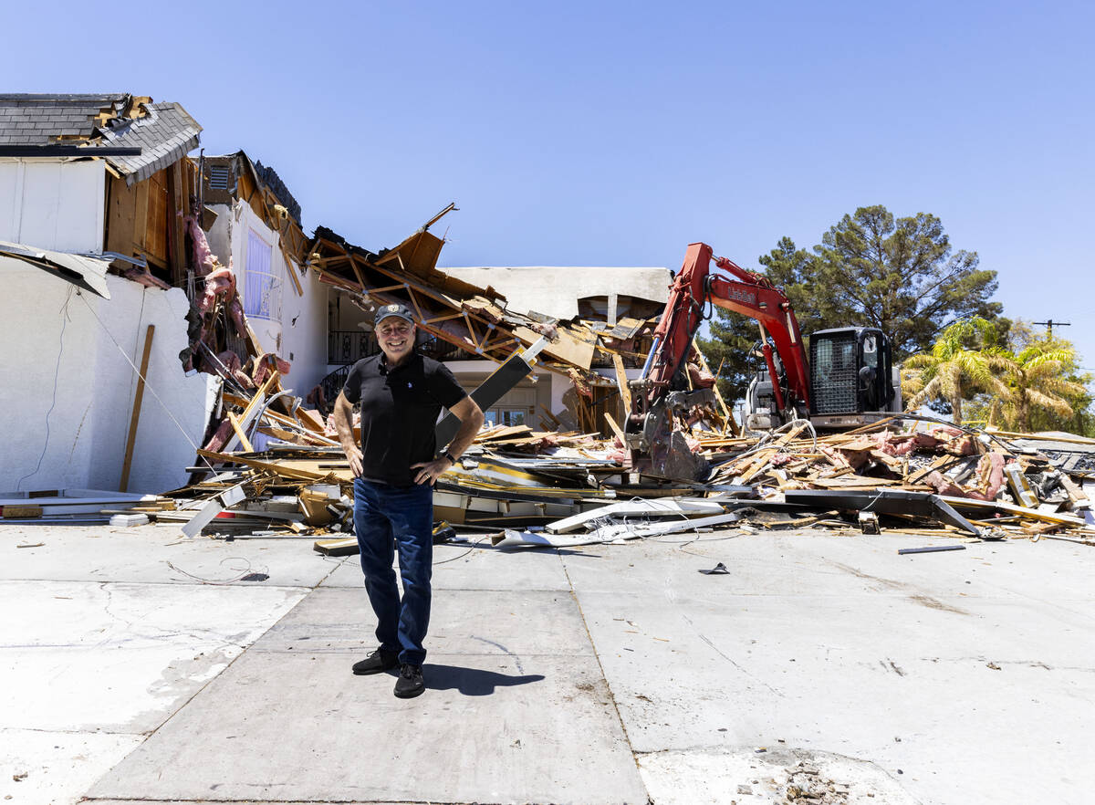 Garry Hart, a former owner of the famous Hartland Mansion estate, poses for a photo in front of ...