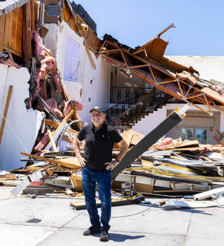 Garry Hart, a former owner of the famous Hartland Mansion estate, poses for a photo in front of ...