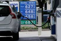FILE— Gas is advertised for more than $6 per gallon at a gas station in Sacramento, Calif., F ...