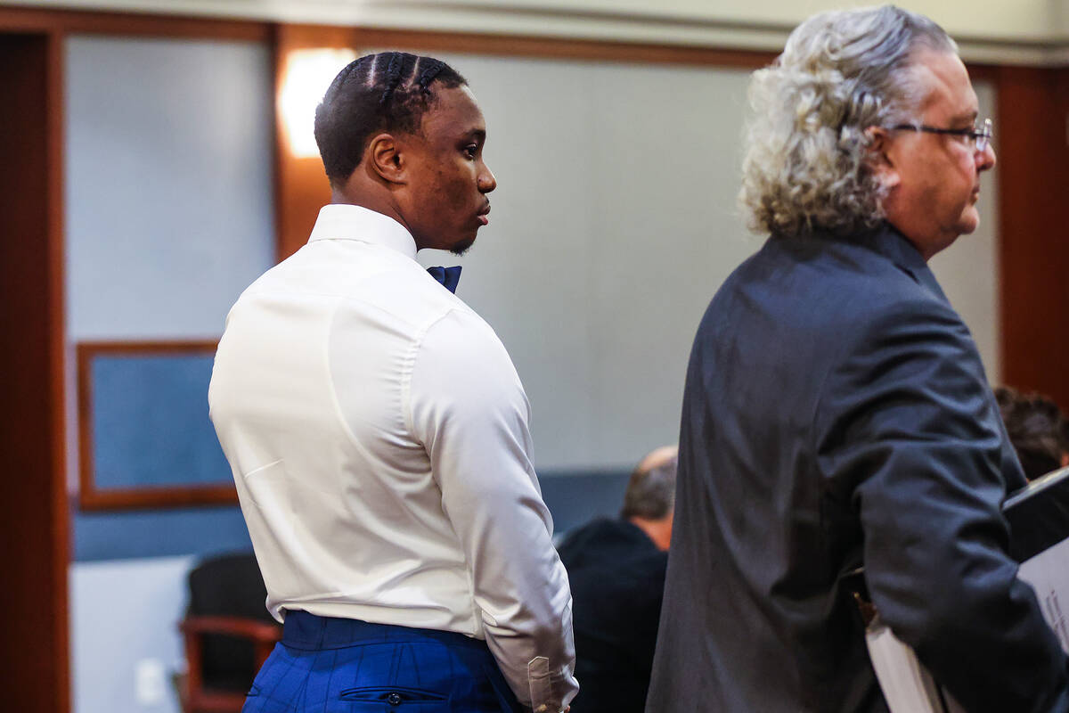 Ex-Raiders wide receiver Henry Ruggs, left, appears at a hearing next to his attorney David Che ...