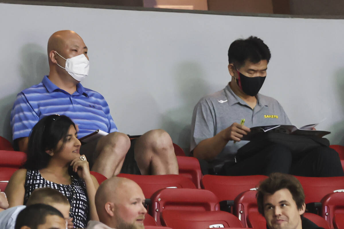 International scouts with Changwon LG Sakers watch the Detroit Pistons play the Portland Trail ...