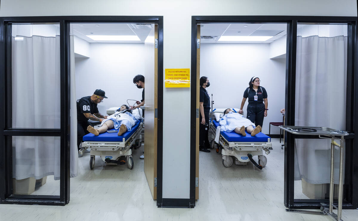 UNLV nursing students work with simulation patients during the weeklong UNLV Nurse Camp at the ...