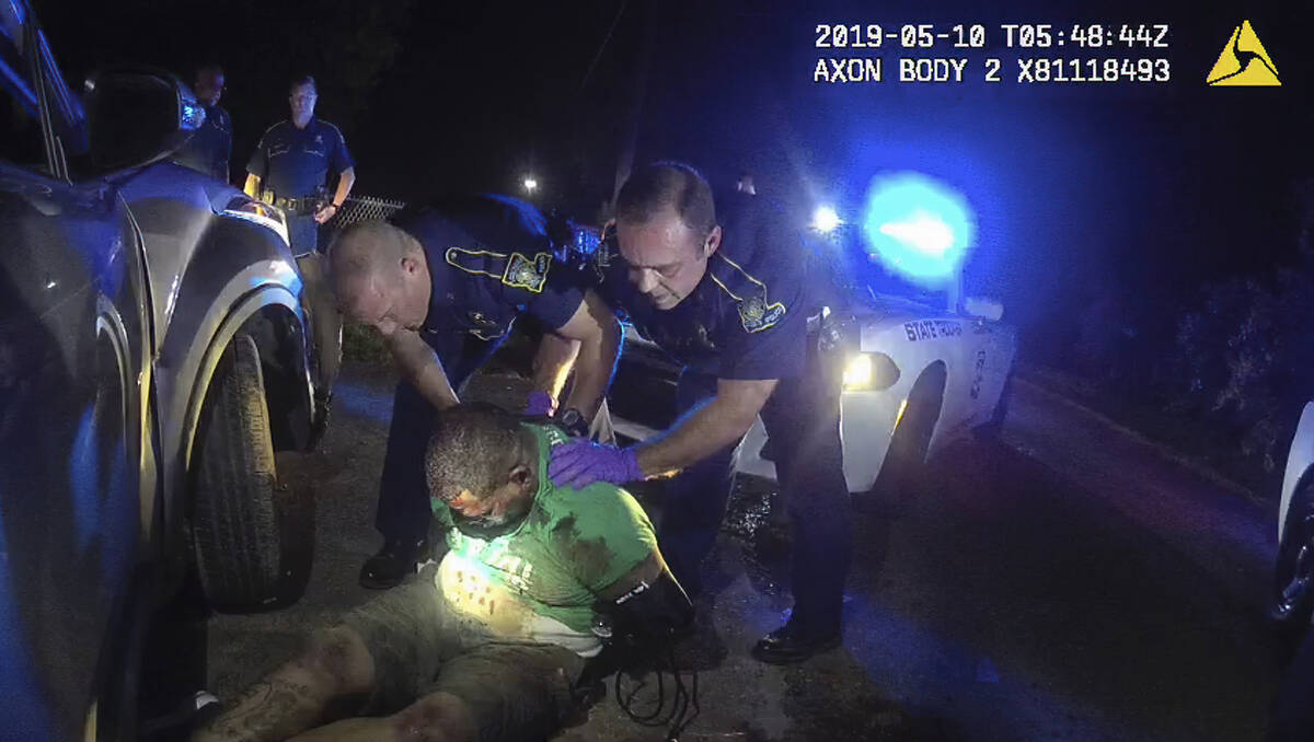FILE - In this image from the body camera of Louisiana State Police Trooper Dakota DeMoss, his ...