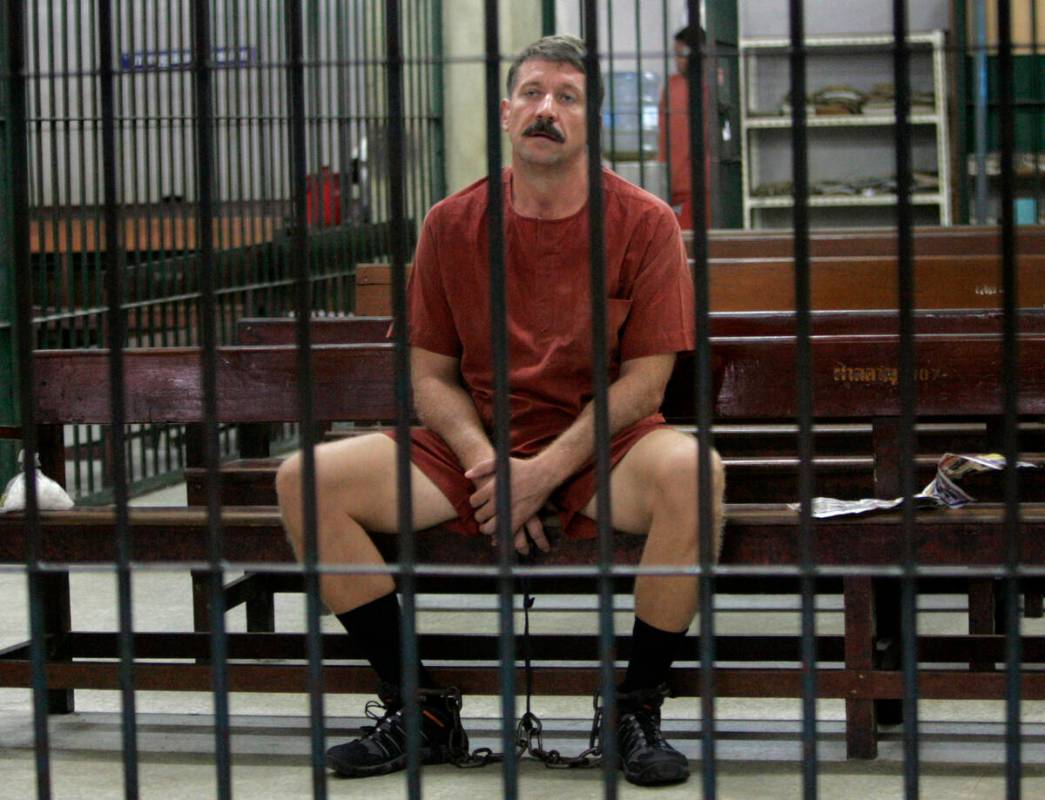 FILE - Viktor Bout sits while waiting for his verdict at the detention room at a criminal court ...