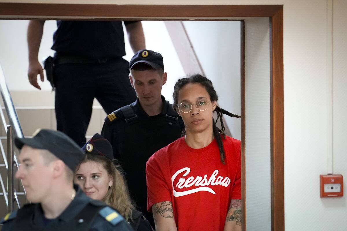 WNBA star and two-time Olympic gold medalist Brittney Griner is escorted to a courtroom for a h ...