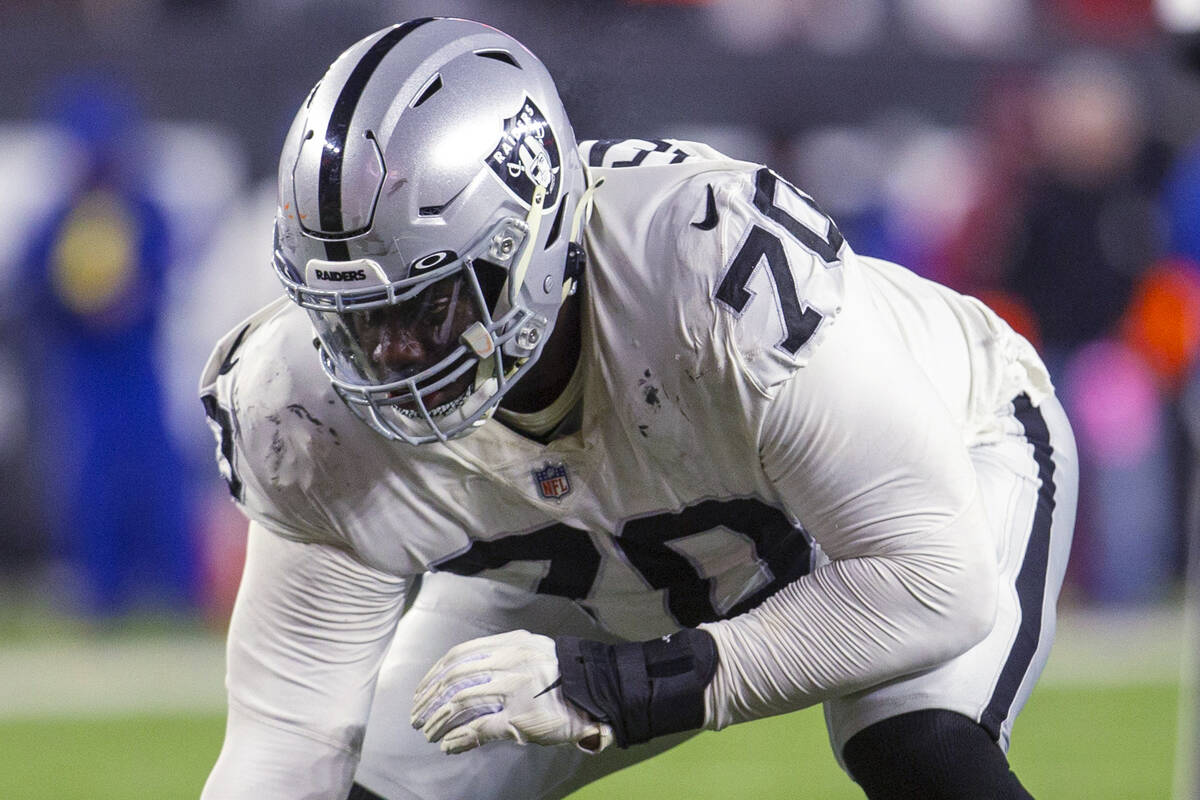 Raiders guard Alex Leatherwood (70) gets set for a play during the second half of an NFL playof ...