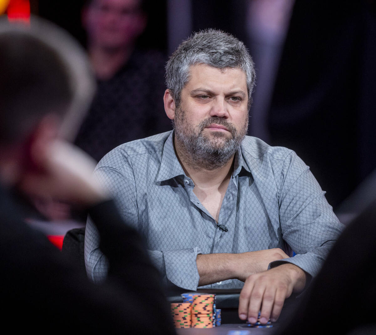 Player Aaron Duzcak considers his hand during final table play at the WSOP Main Event within th ...