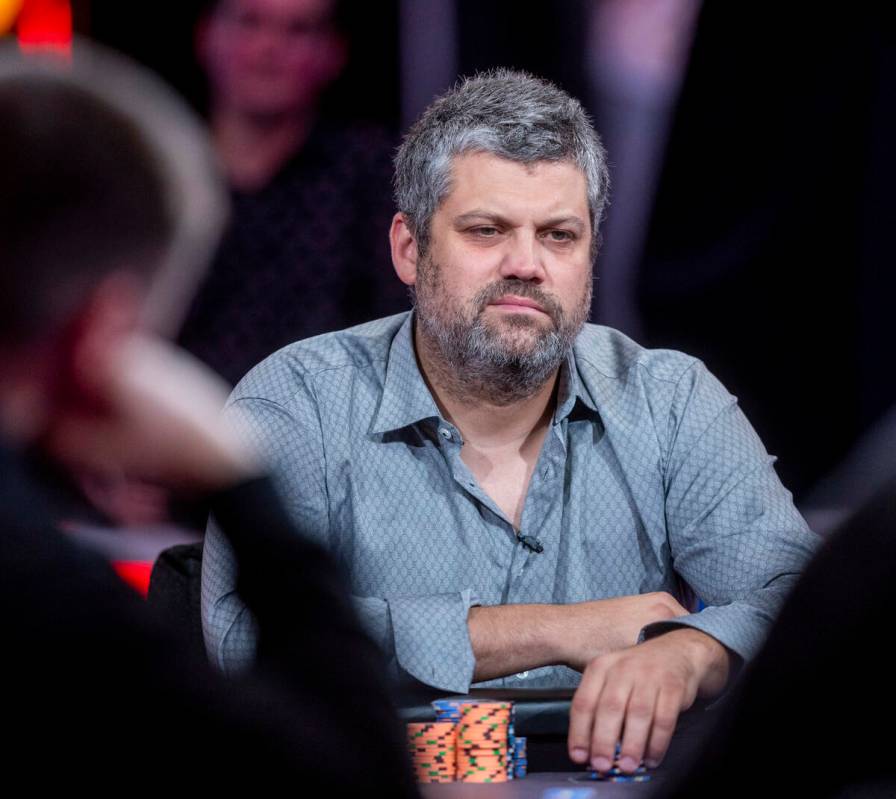 Player Aaron Duzcak considers his hand during final table play at the WSOP Main Event within th ...