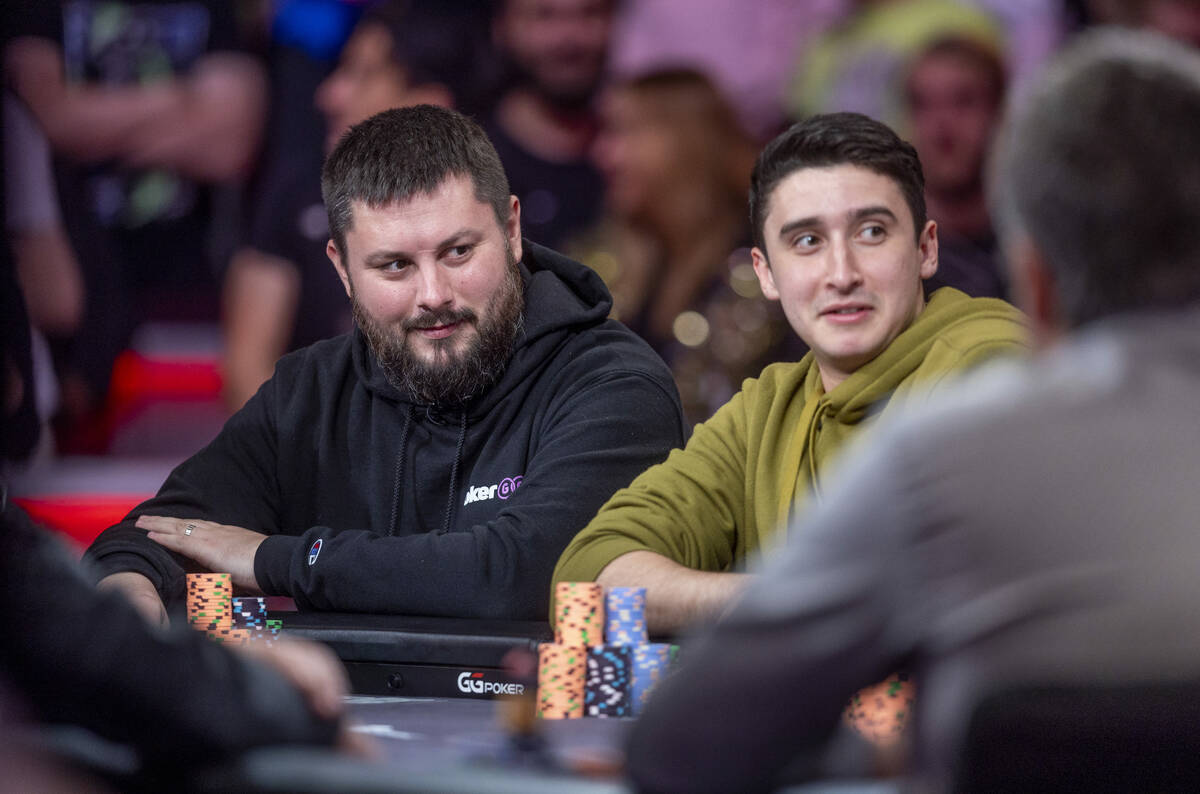 Players Matija Dobric, left, and Michael Duek enjoys some of the conversation during final tabl ...