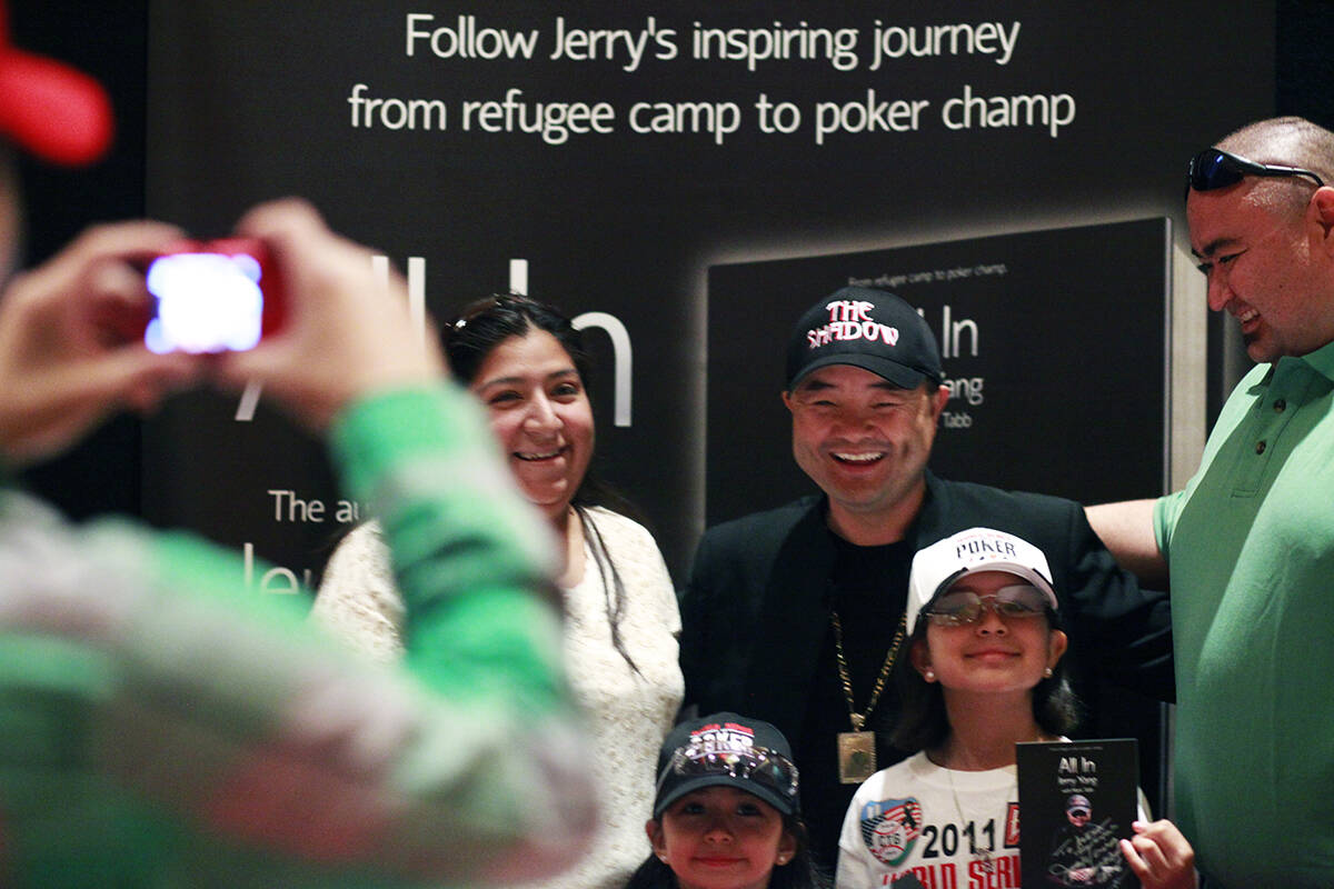 2007 World Series of Poker Main Event Champion Jerry Yang poses for a picture with, from left, ...