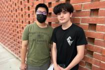 Edwin Ma, left, and Troy Harris stand outside the Clark County School District Edward A. Greer ...