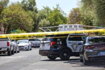 Police at scene of a homicide in the 2500 block of Perryville Avenue in Las Vegas, Sunday, July ...
