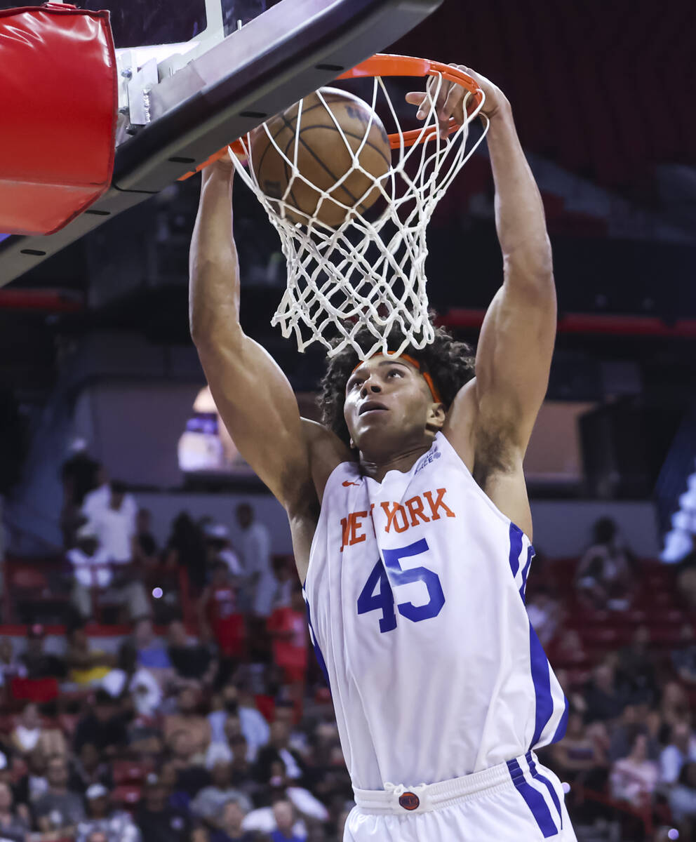 New York Knicks' Jericho Sims (45) dunks the ball against the Portland Trail Blazers during the ...