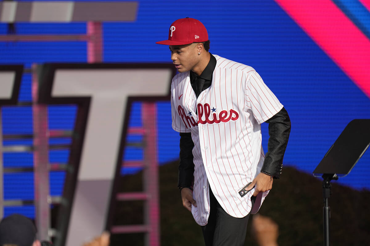 Justin Crawford walks on the stage after being selected by the Philadelphia Phillies with the 1 ...