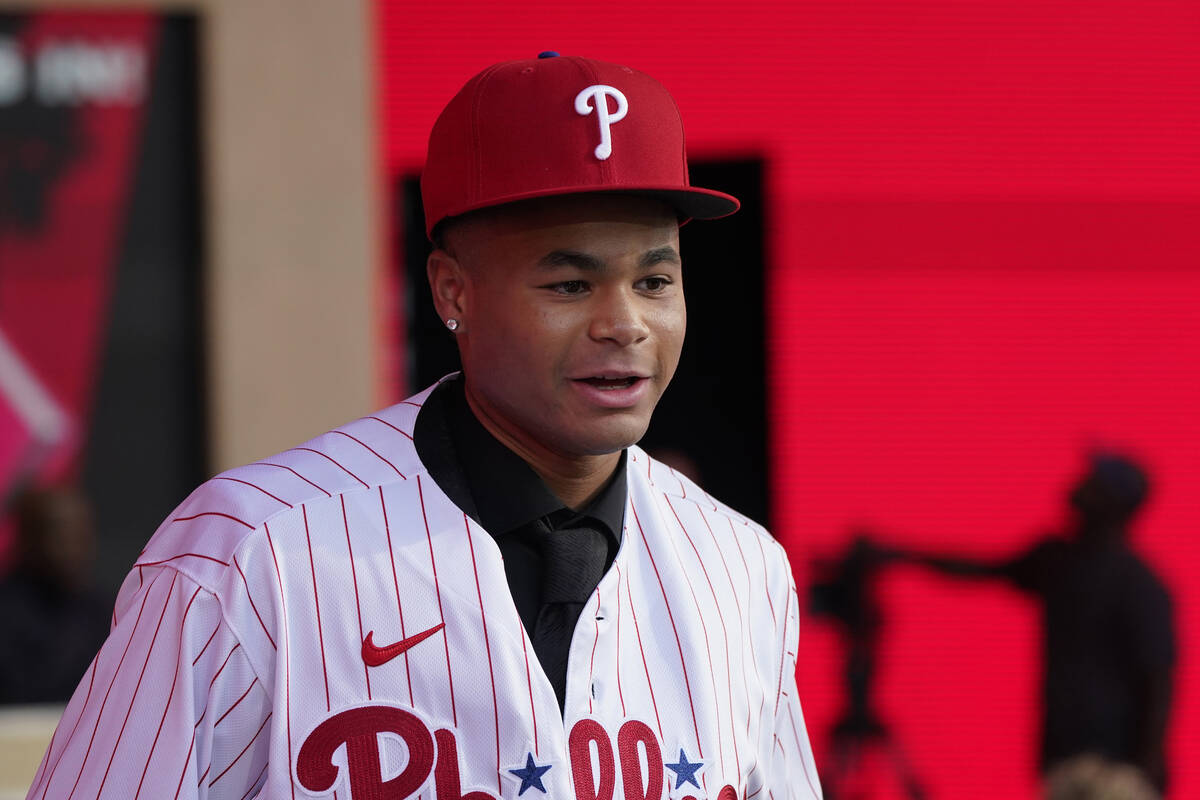 Justin Crawford walks on the stage after being selected by the Philadelphia Phillies with the 1 ...