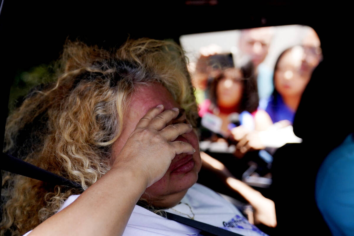 Grace Valencia, great aunt of shooting victim Uziyah Garcia, talks to the media from a vehicle ...