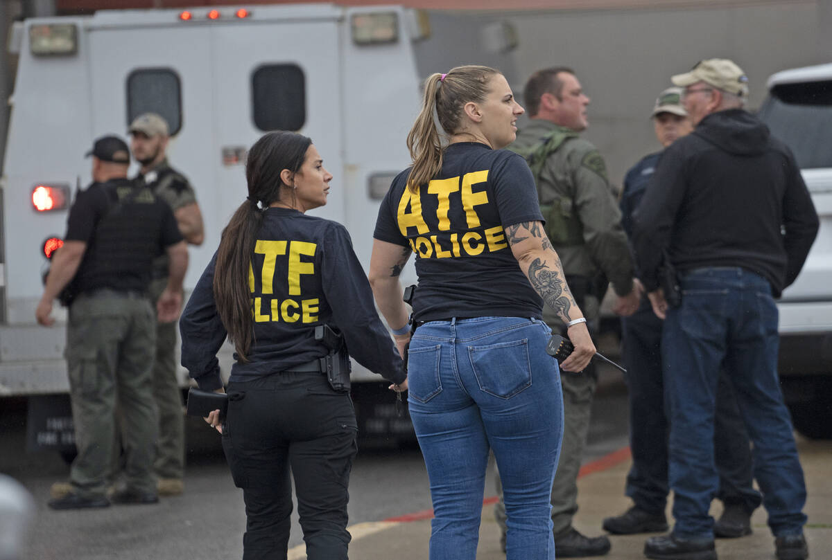 ATF officers arrive on the scene following a deadly shooting Sunday, July 17, 2022, at the Gree ...