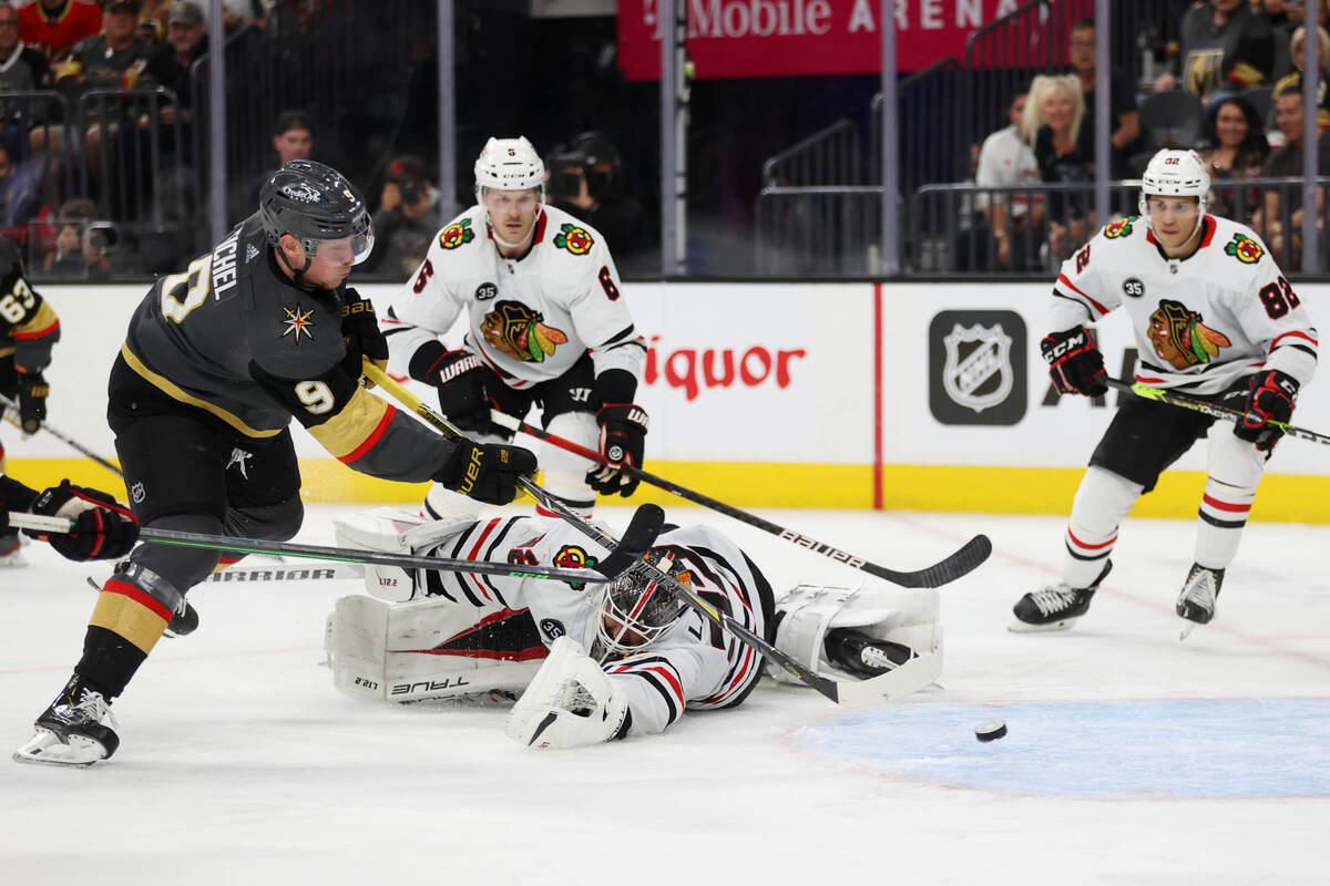 Vegas Golden Knights center Jack Eichel (9) shoots for a score against Chicago Blackhawks goalt ...