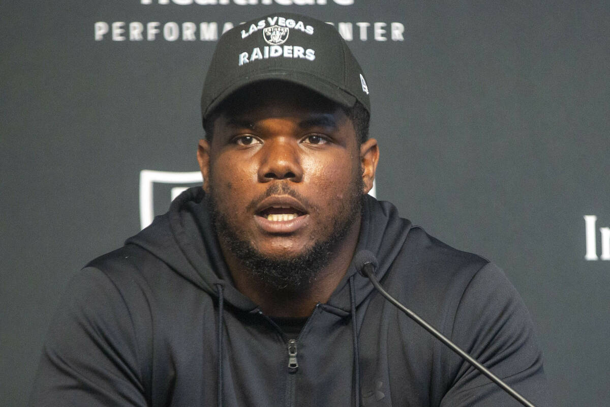 Raiders defensive tackle Bilal Nichols answers questions during a news conference at the Raider ...