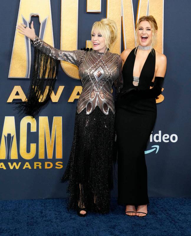 Dolly Parton, left, and Kelsea Ballerini arrive at the 57th Academy of Country Music Awards on ...