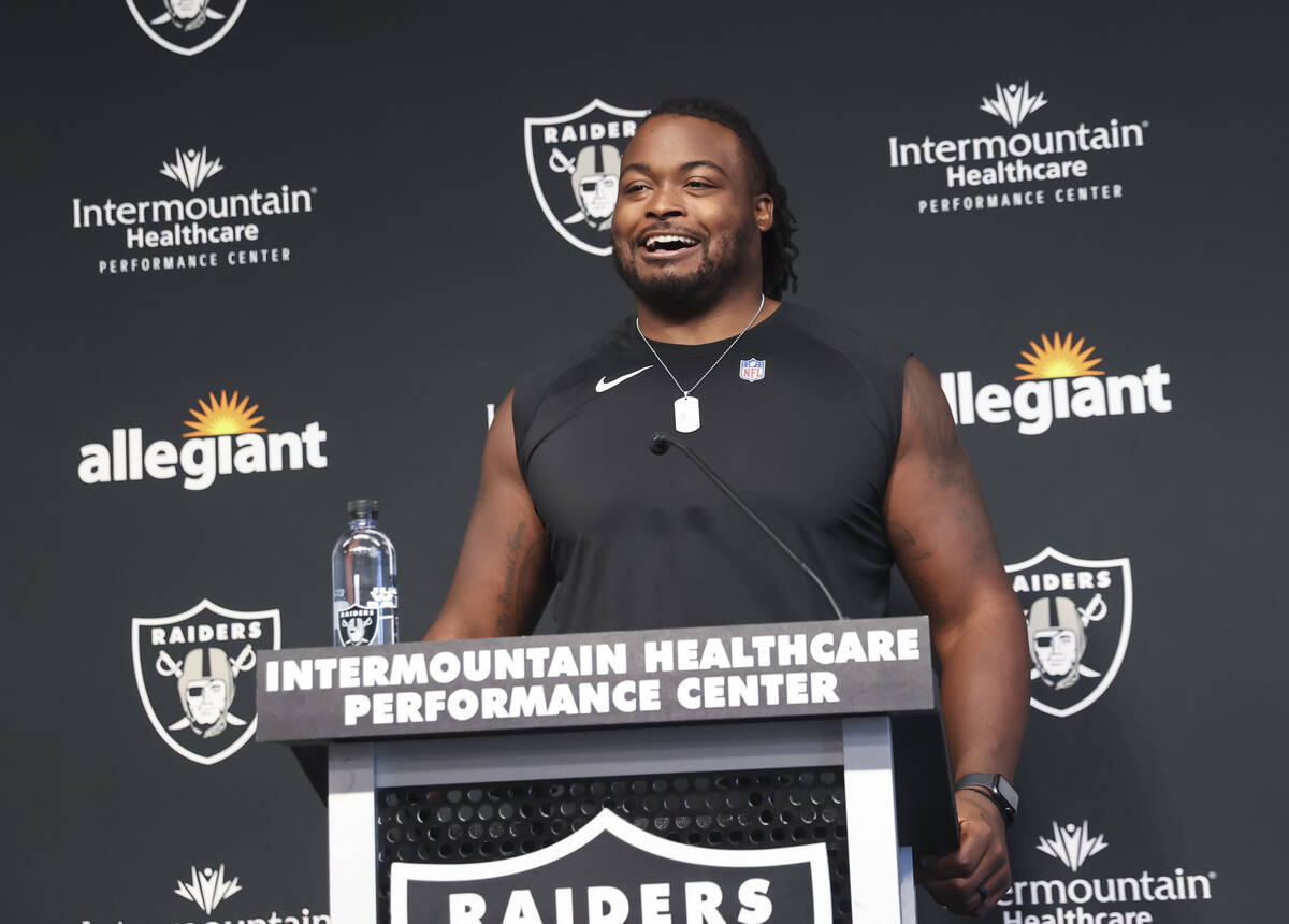 Raiders offensive guard John Simpson speaks during a press conference at Raiders Headquarters a ...