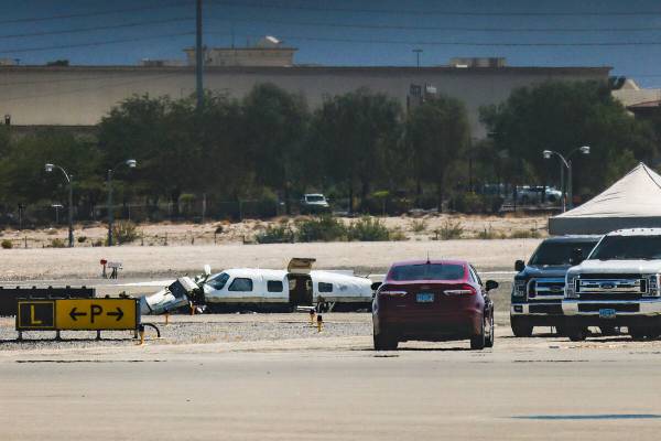 The scene of a plane crash at North Las Vegas Airport in North Las Vegas, Sunday, July 17, 2022 ...