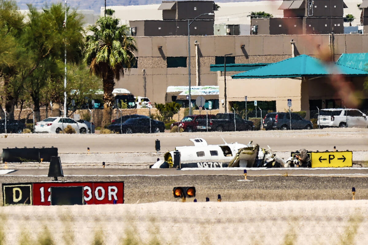 The scene of a plane crash at North Las Vegas Airport in North Las Vegas, Sunday, July 17, 2022 ...