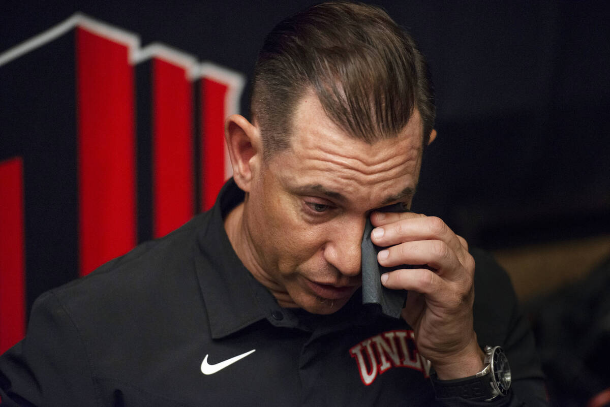 UNLV head coach Marcus Arroyo tears up while talking about the death of former Oregon tight end ...
