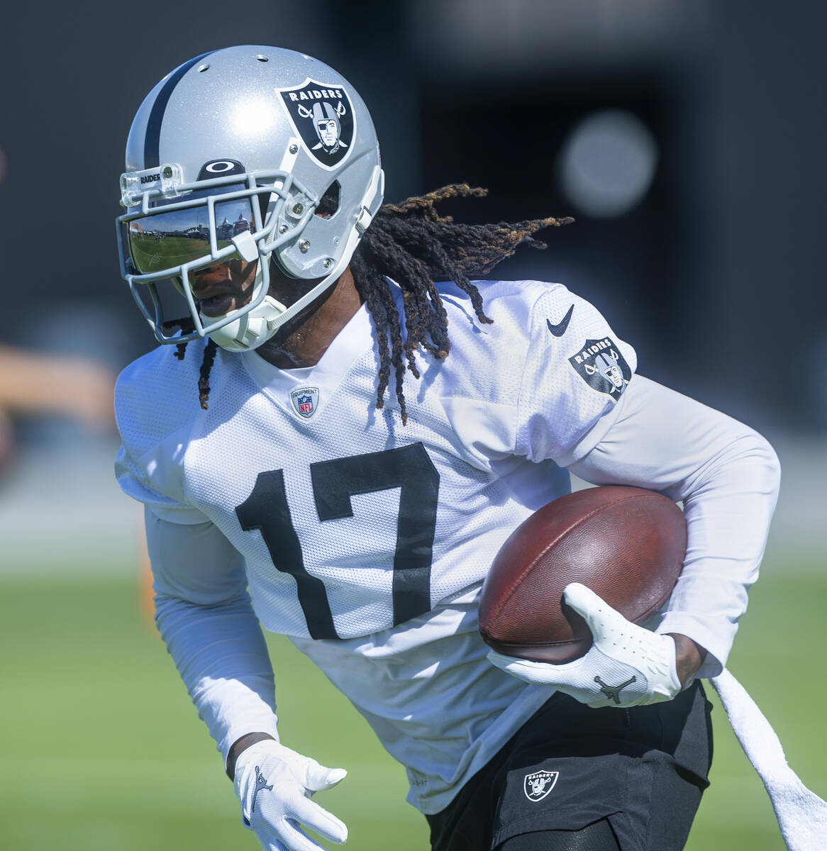 Wide receiver Davante Adams (17) runs after a pass reception during the Raiders first practice ...