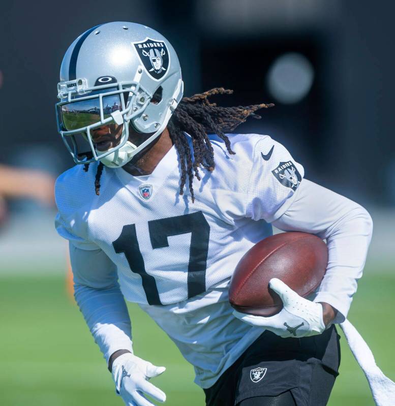 Wide receiver Davante Adams (17) runs after a pass reception during the Raiders first practice ...