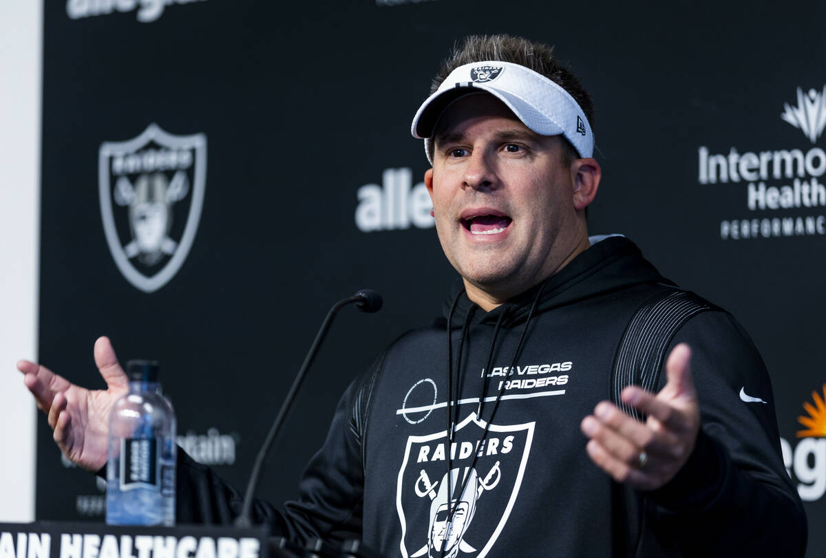 Raiders head coach Josh McDaniels talks about players during their first practice at training c ...