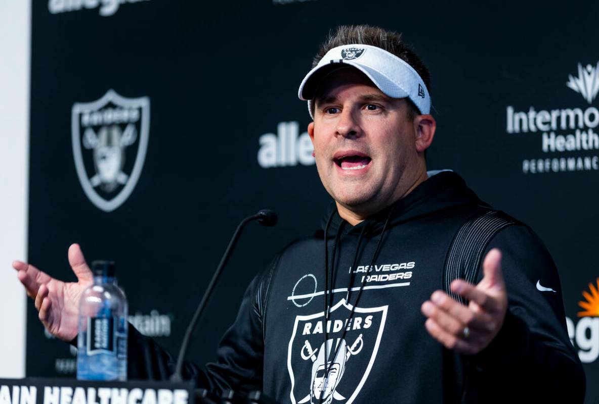 Raiders head coach Josh McDaniels talks about players during their first practice at training c ...