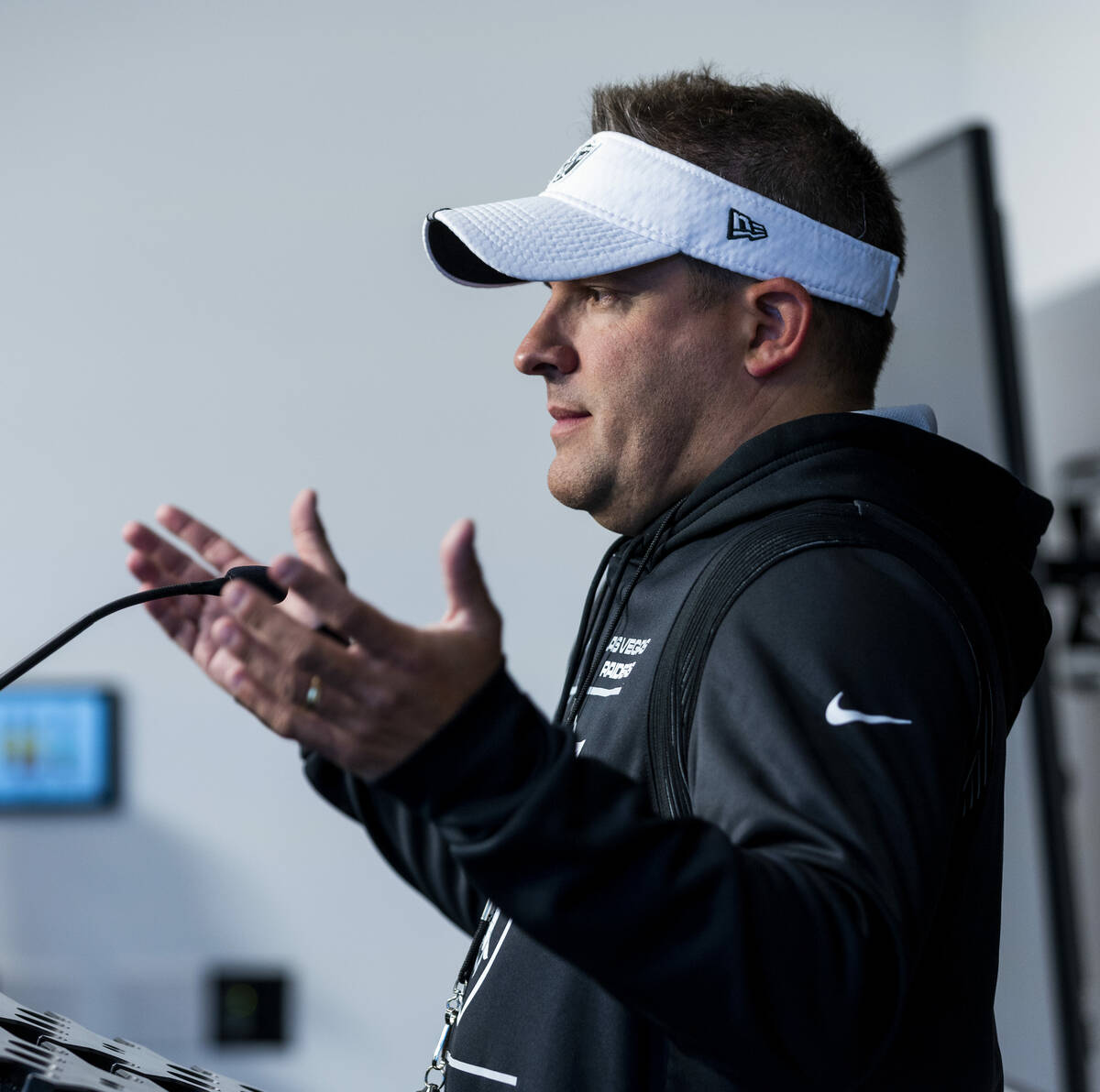 Raiders head coach Josh McDaniels talks about players during their first practice at training c ...