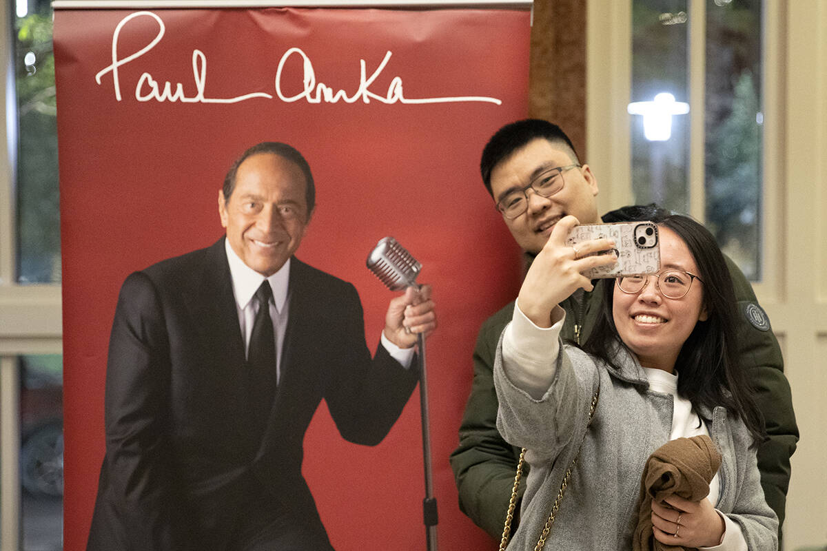 Attendees of the 10th anniversary celebration at The Smith Center for the Performing Arts take ...