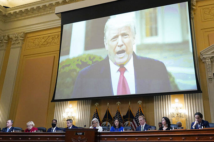 A video of President Donald Trump is shown on a screen, as the House select committee investiga ...