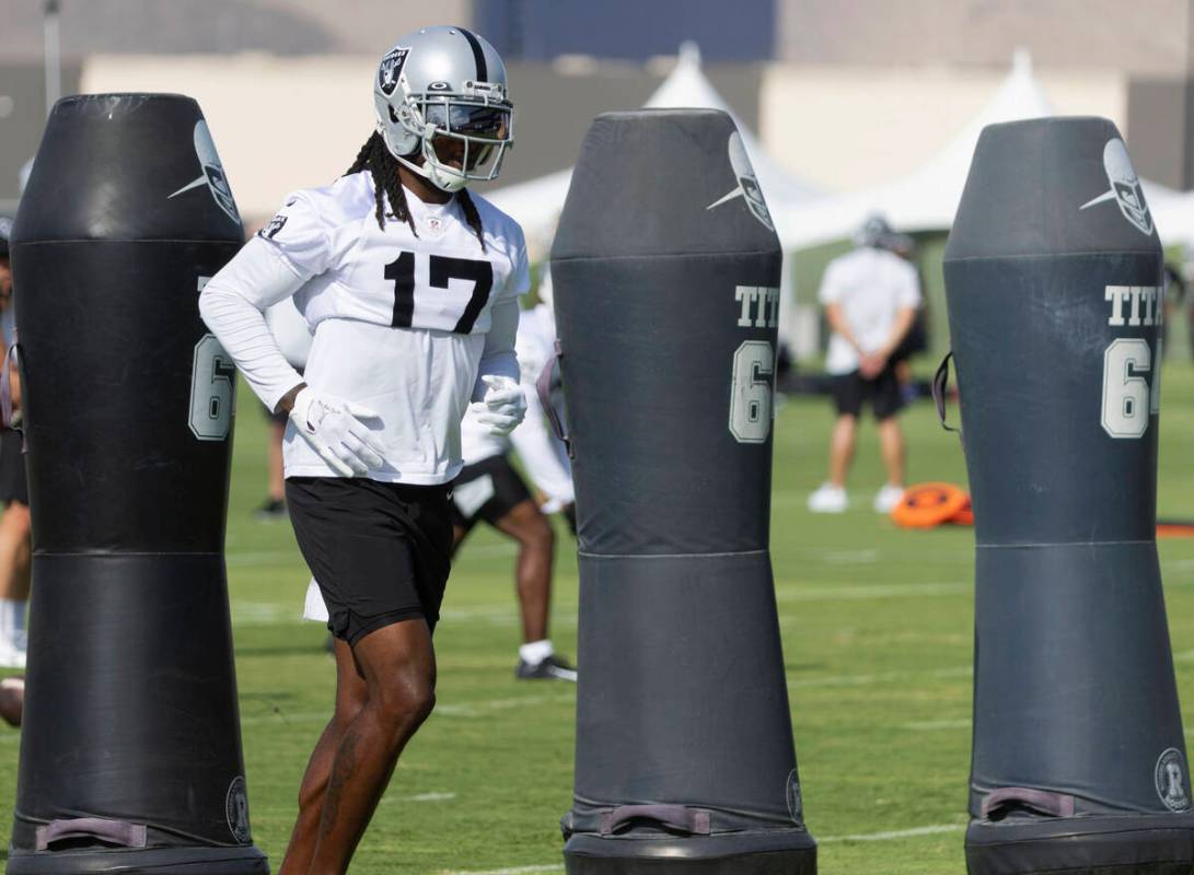 Raiders wide receiver Davante Adams (17) runs the drill during team's practice at training camp ...