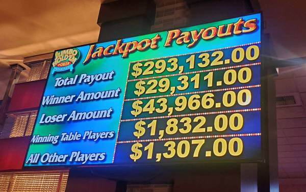 A Sante Fe Station video board shows the payoffs for the "bad beat" progressive jackpot scored ...