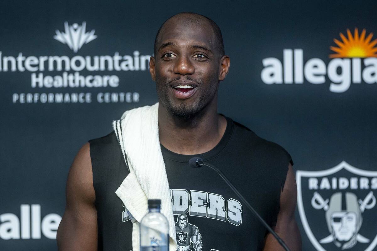 Safety Duron Harmon speaks in a press conference during the Raiders first practice at training ...