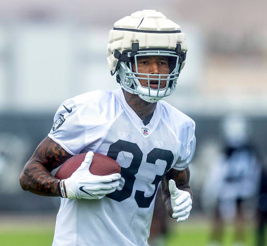 Raiders tight end Darren Waller (83) runs with the ball after a catch during training camp in t ...