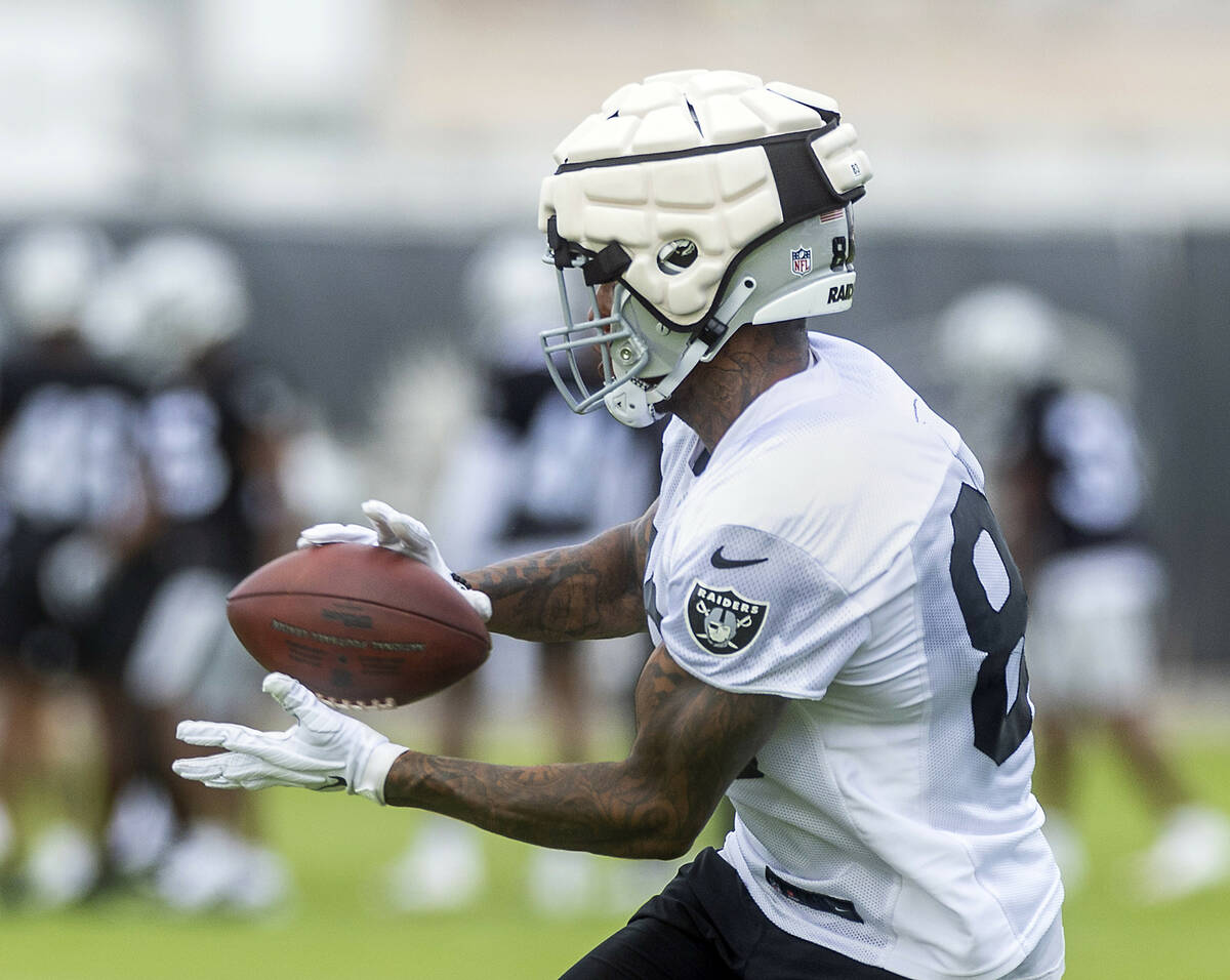 Raiders tight end Darren Waller (83) secures a pass during training camp in the Intermountain H ...