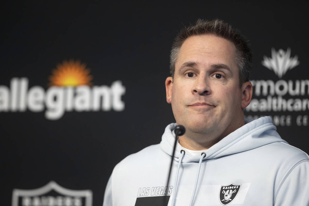 Raiders head coach Josh McDaniels reacts to a media question during a news conference prior to ...
