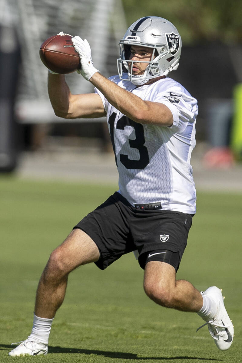 Raiders wide receiver Hunter Renfrow (13) makes a catch during the team’s training camp ...