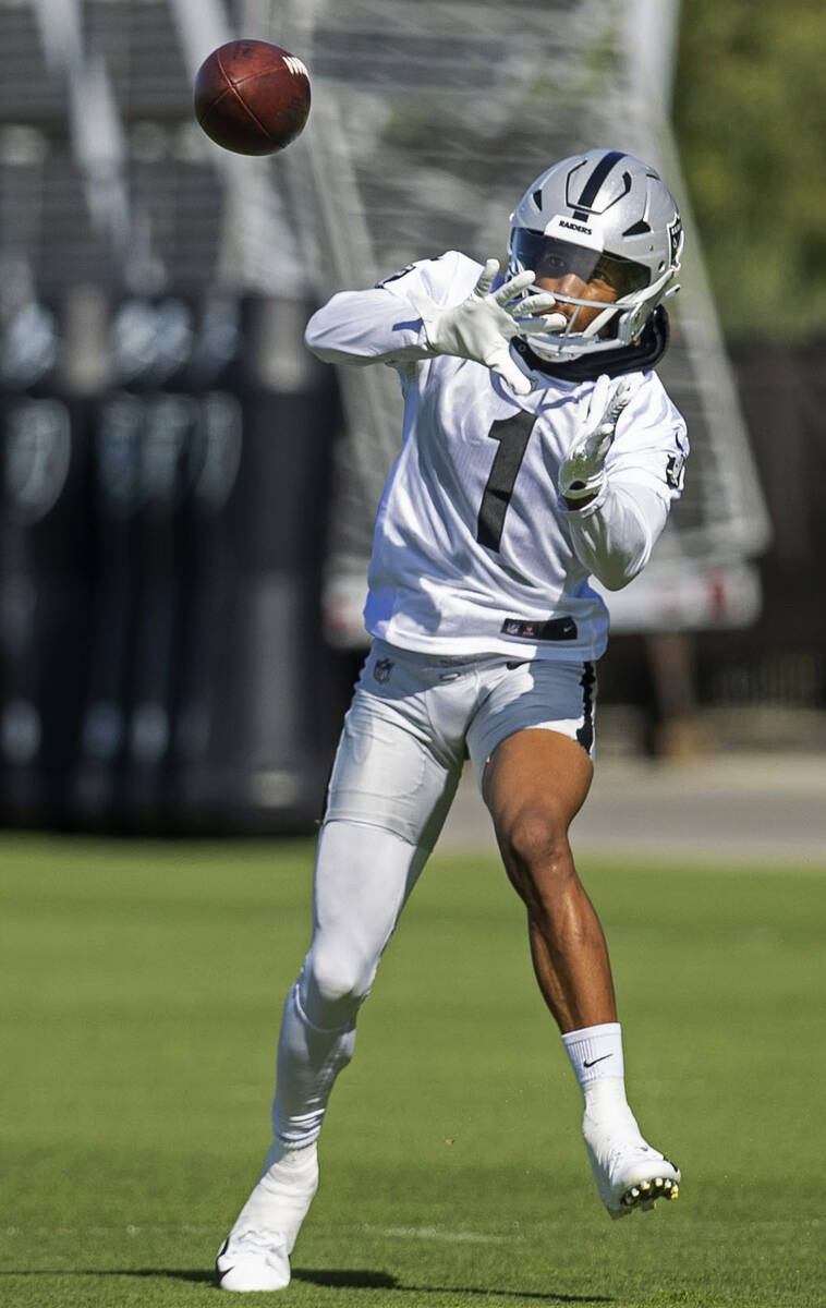 Raiders wide receiver Tyron Johnson (1) makes a catch during the team’s training camp pr ...