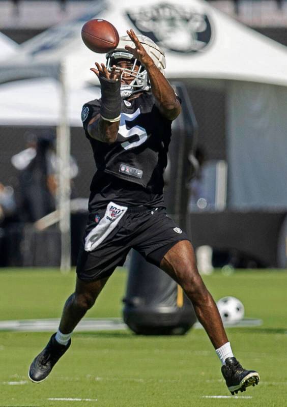 Raiders linebacker Divine Deablo (5) makes a catch during the team’s training camp pract ...
