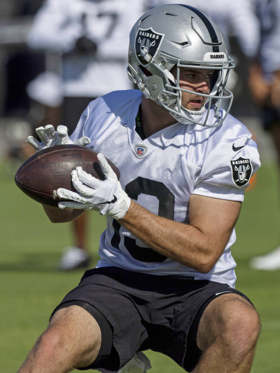 Raiders wide receiver Hunter Renfrow (13) looks to run after making a catch during the team&#x2 ...