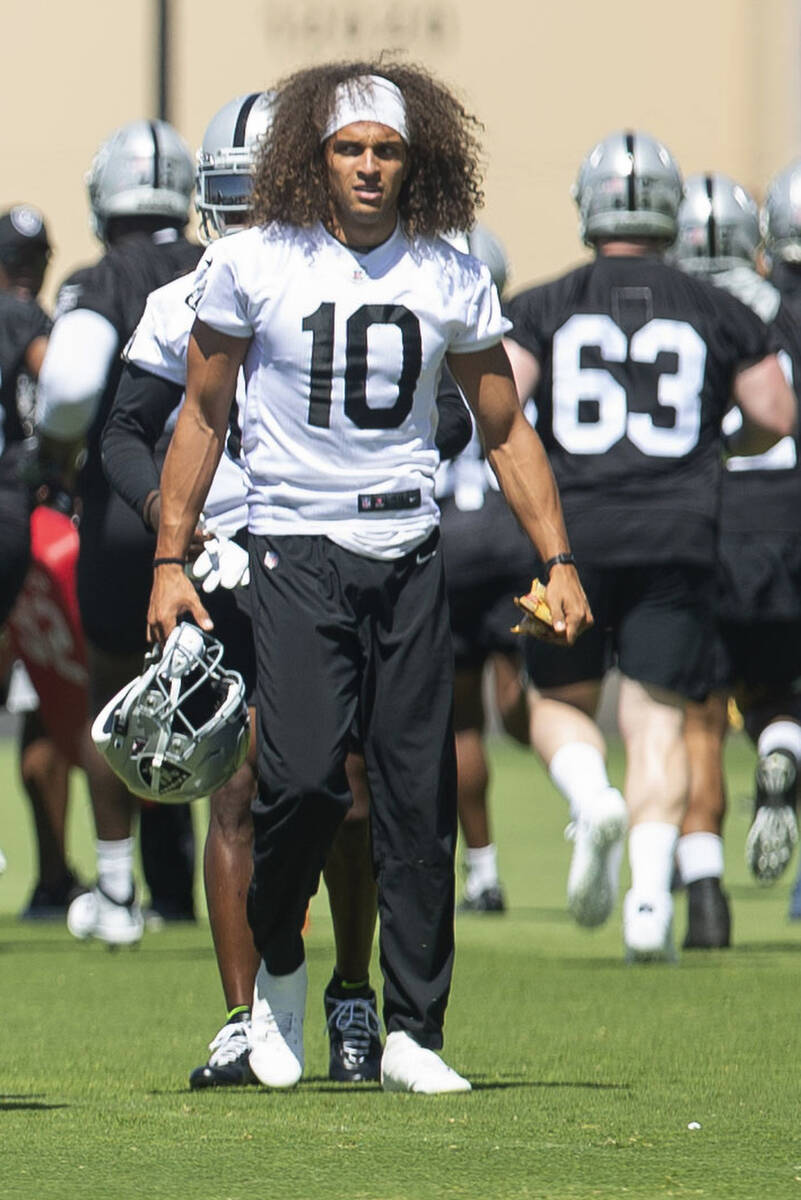 Raiders wide receiver Mack Hollins (10) walks the field during a practice on Thursday, May 26, ...