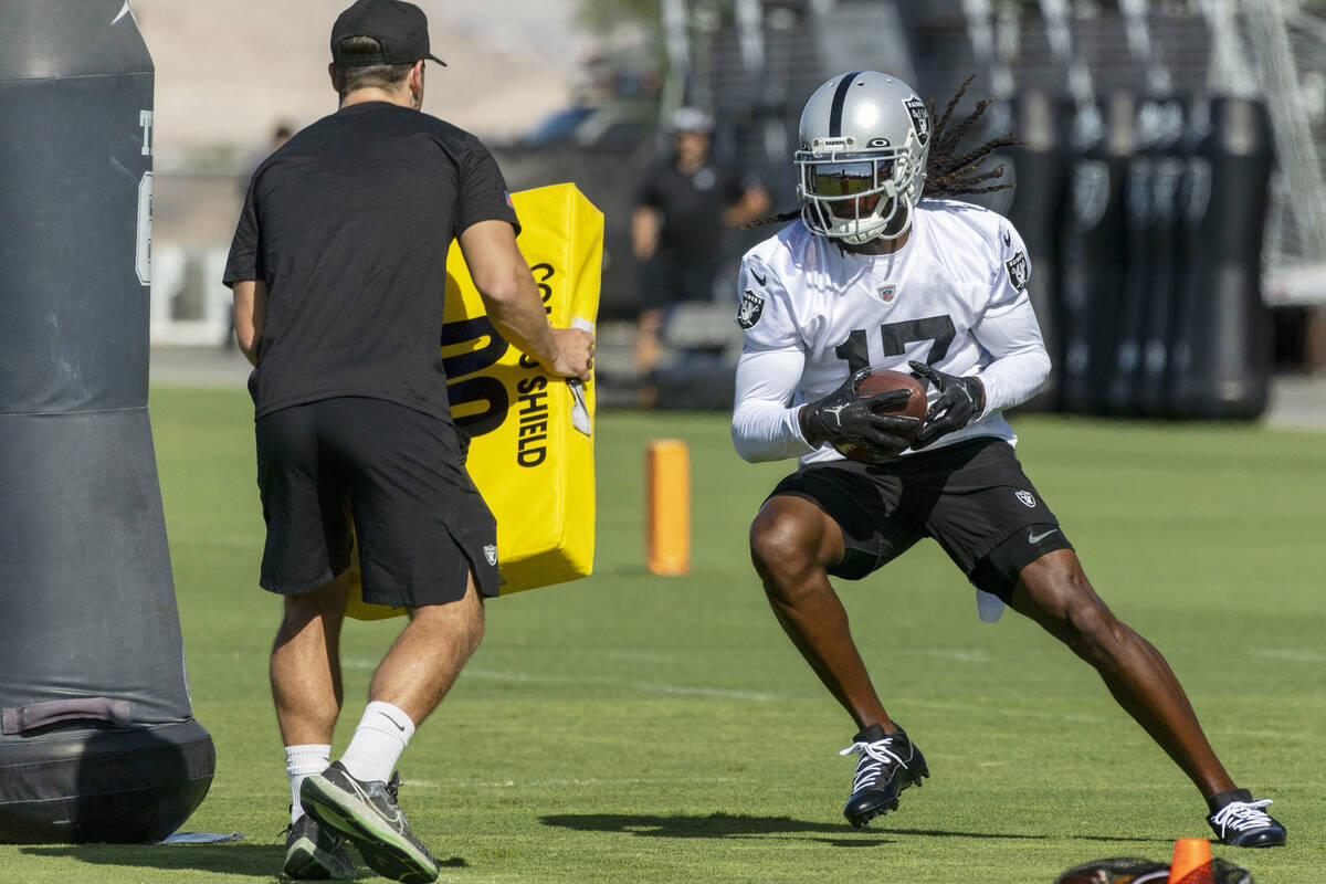 Raiders wide receiver Davante Adams (17) makes a catch during the team’s training camp p ...