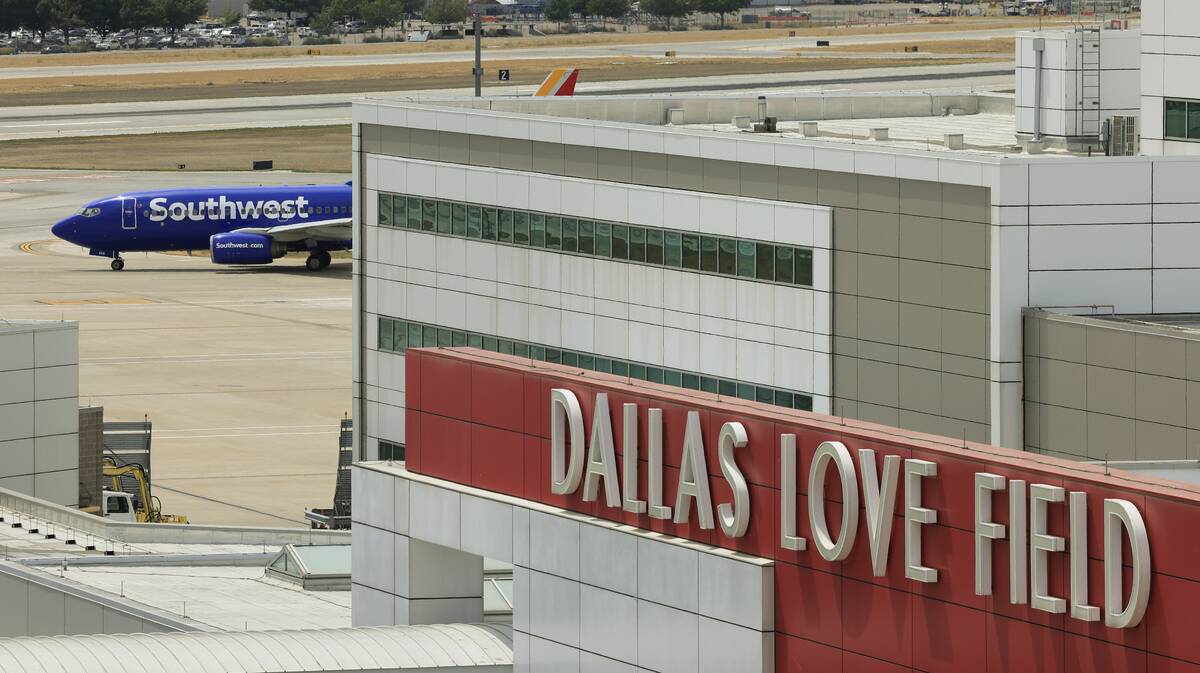 A Southwest Airlines plane taxis towards the runway at Dallas Love Field Airport in Dallas, Thu ...